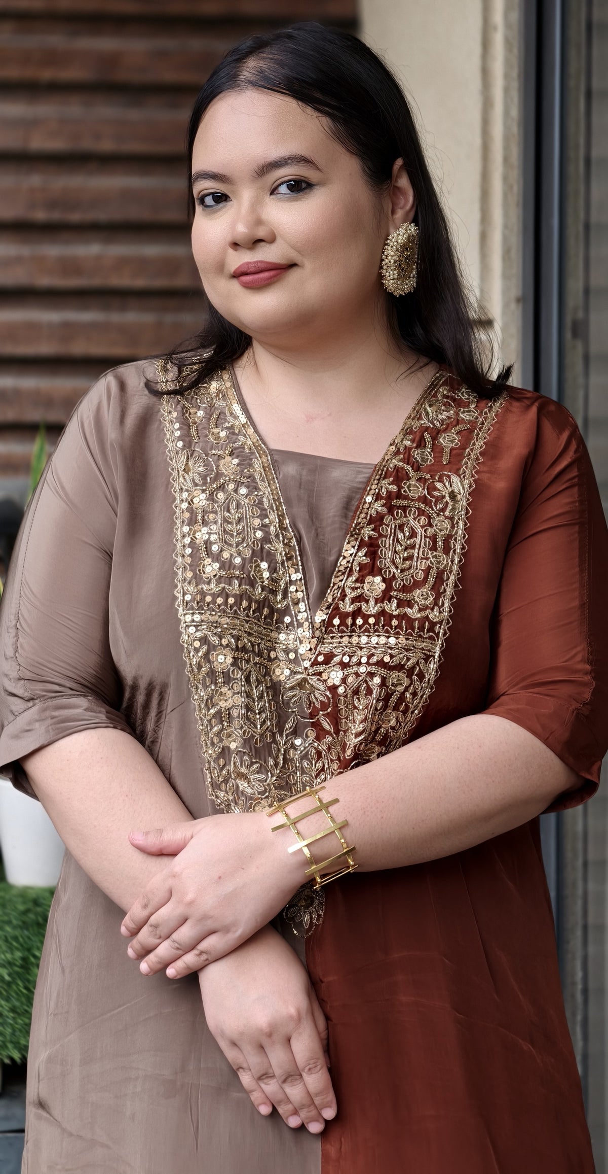 Close-up of the gold zari and sequin embroidered V-panel yoke